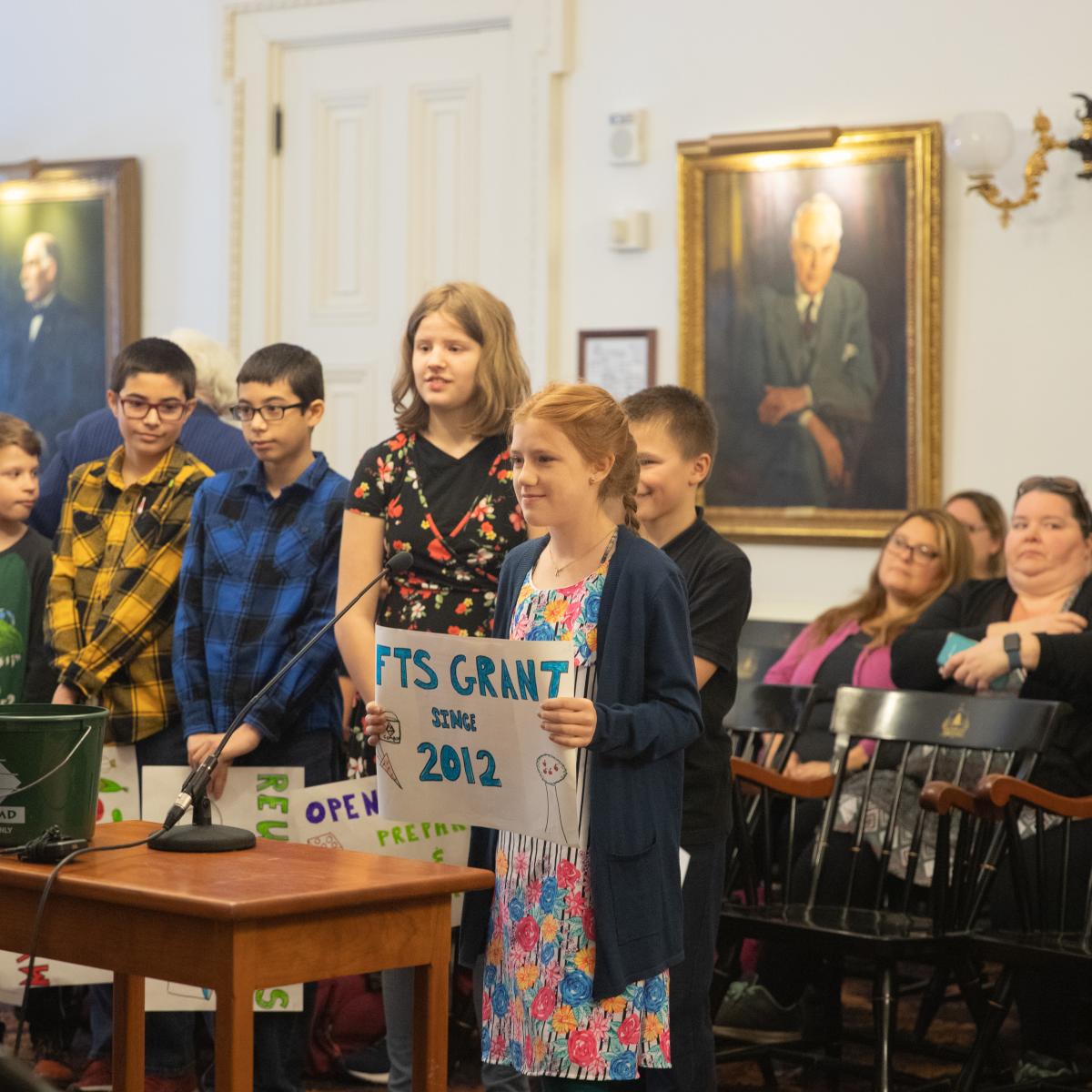 Students speak at the Vermont State House on Farm to School Awareness Day. Students speak at the Vermont State House on Farm to School Awareness Day.