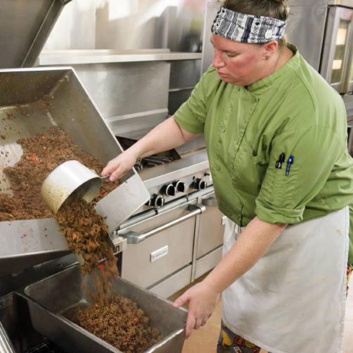 a school nutrition professional cooks sloppy joes a school nutrition professional cooks sloppy joes